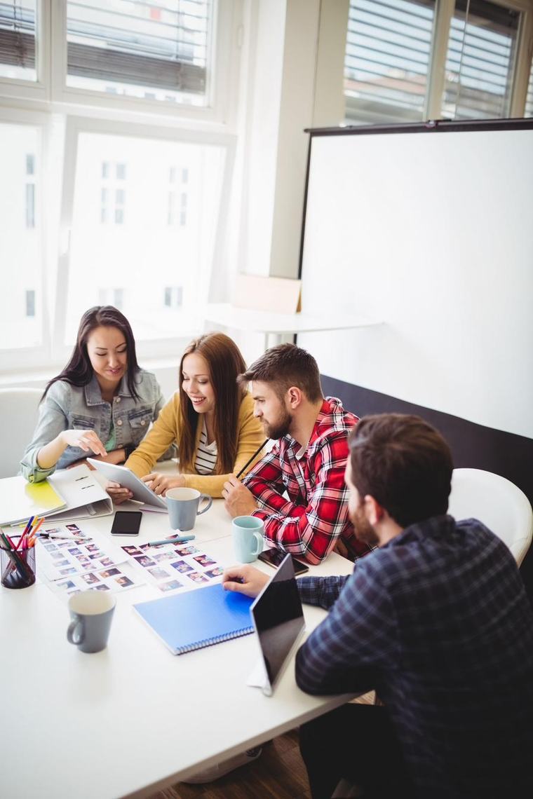 Content team reviewing creative work in a Mississauga office